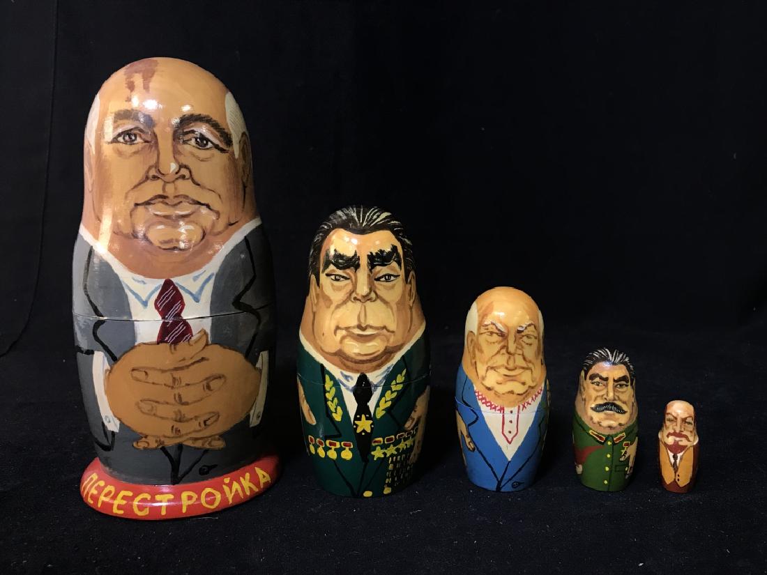 Russian Leaders Nesting Dolls Hand Painted: Hand Painted Russian politicians leaders Gorbachev, Brezhnev, Hrutchev, Stalin, Lenin matryoshka nesting doll 5 piece set, largest measures approx 7.75 inches tall x 3.5 inches in diameter. Russian Ne
