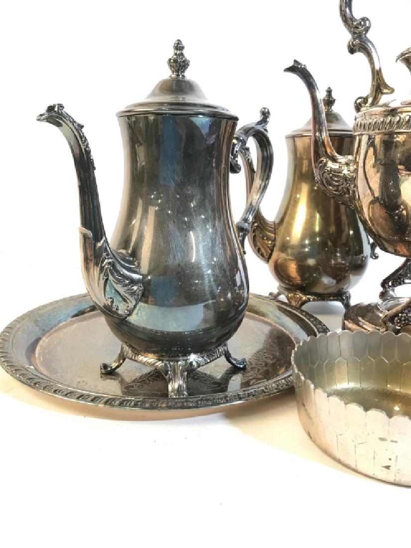 Group Lot Silver Pl Coffee Pots, Trays, More: Lot includes large serving platter with three sections, Repousse florals in relief measures app 22 by 16 inches, Lidded sugar, Footed coffee pots and ornate tea pot with Stand ht app 15 inches, silver