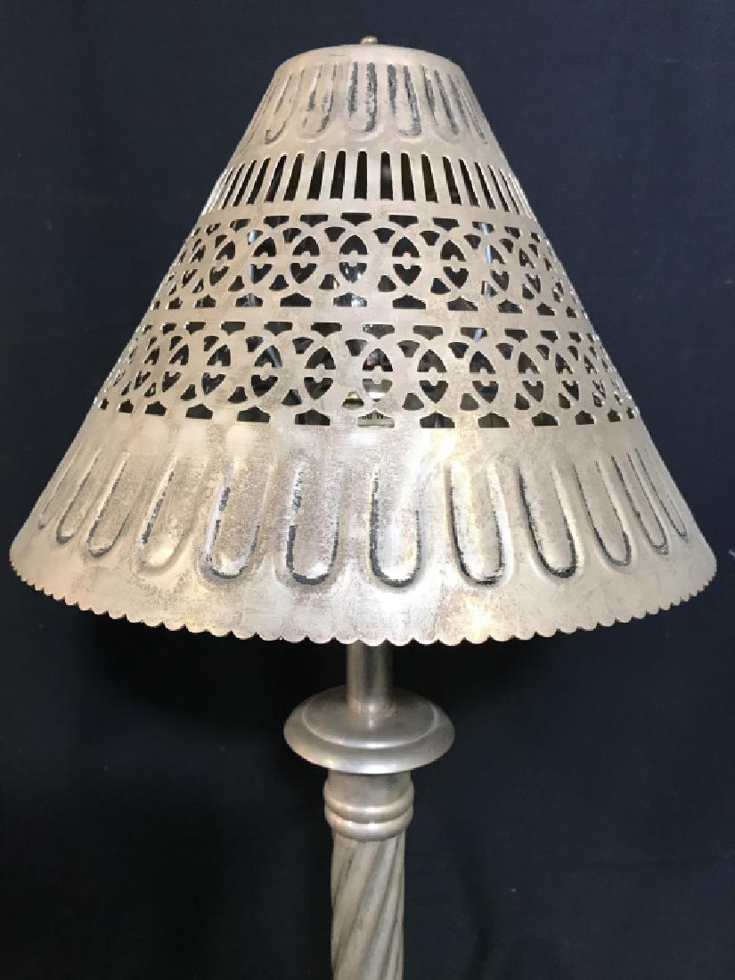 Silver Toned Metal Lamp W Pierced Detail Shade: Lamp is silver toned and metal. Shade has intricate pierced detail. Includes finial. Measures approx 26 inches tall, 11 inches wide with shade. Table lamp, side table lamp, end table lamp, metal lamp.