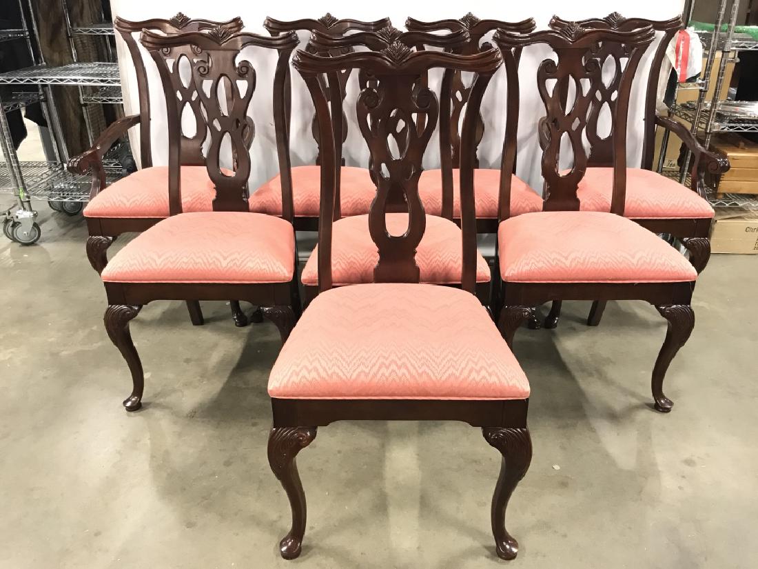 THOMASVILLE Chippendale Style Dining Chairs: Tag on underside reads THOMASVILLE FURNITURE. Pieces have carved wooden detail. Seat cushions are Upholstered with coral toned fabric. Includes 6 side chairs & 2 end chairs. End chairs measure approx