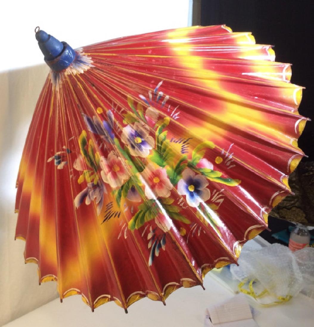 Vintage Painted on Paper Parasol Decor: No rips. Butterfly Motif & Flower Motif. Asian Style. Appears to only Open Part Way. May need to fix underside so parasol remains open for display. Tested to open to approx 23 in diameter. Wooden Hand