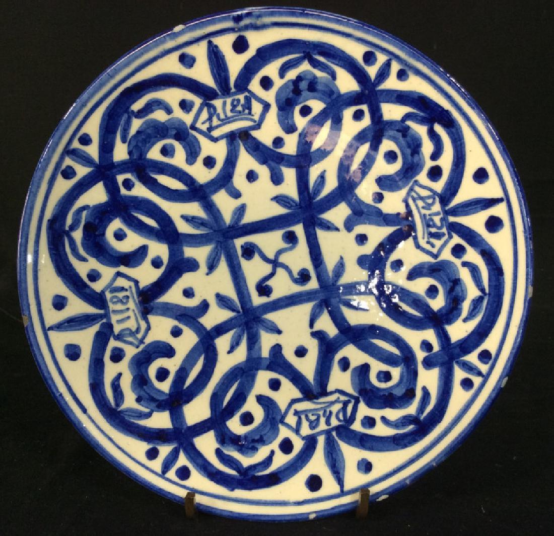 Hand-Painted Ceramic Plate, Spain: Hand-Painted ceramic plate, blue and white in tone. Underside marked for Made in Spain. Measures approx 9 inches in diameter. Some minor chips along rim. Hand-Painted Dishware, Tableware, Ceramic Plat
