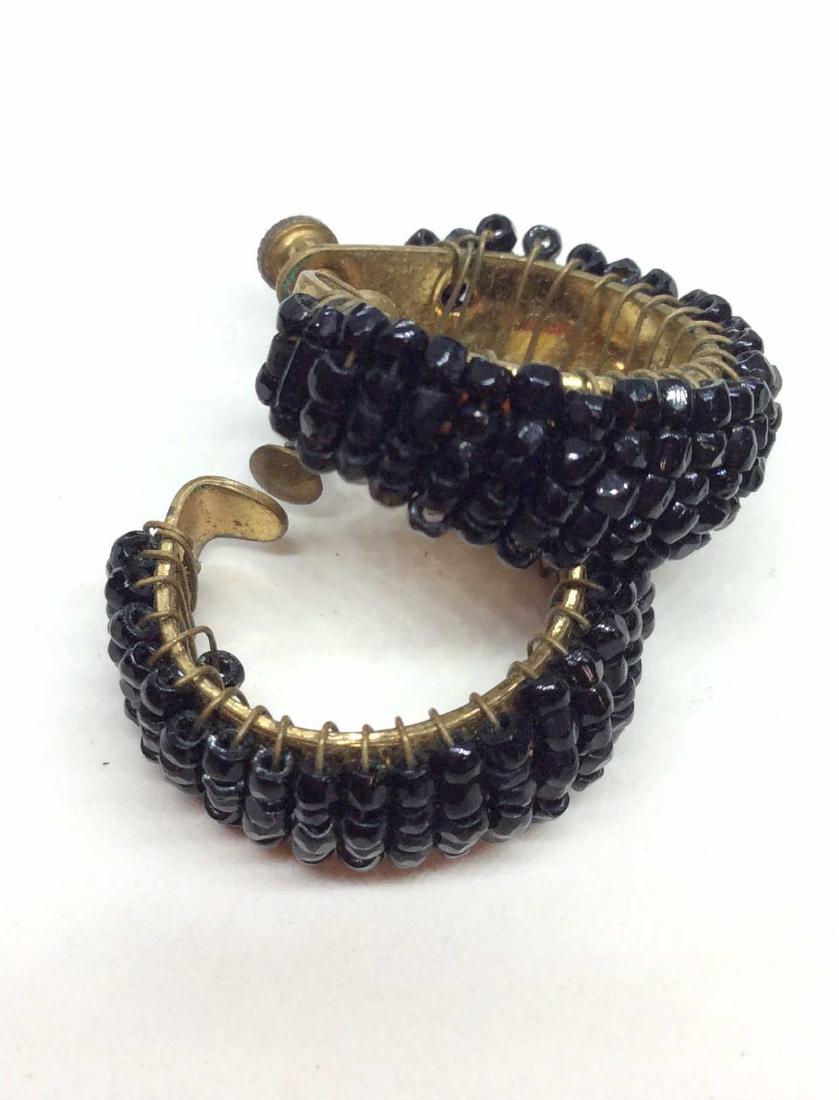Black Seed Bead Hoop Ear Clips: Screw back clip in earrings hoops, wire wrapped with black toned beads, Measures approx 1 in. Women’s vintage costume estate jewelry, fashion accessories, wearable accessories, some discoloring to m
