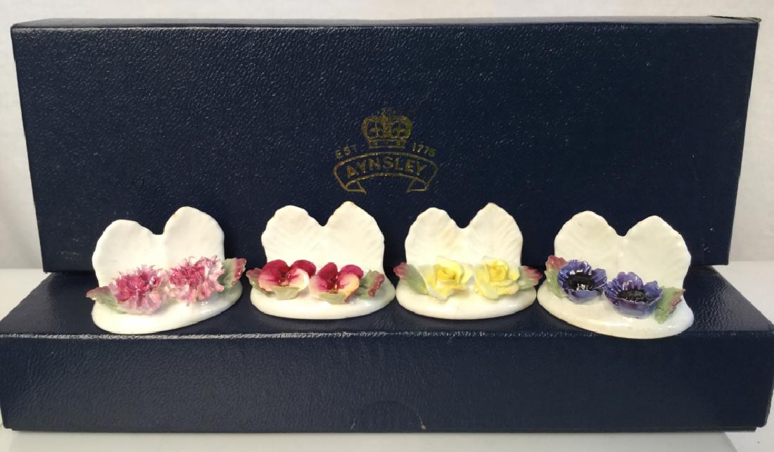 Set 12 AYNSLEY China Place card Holders: Set 12 AYNSLEY China Place card Holders. AYNSLEY England hand modeled and Hand painted, fine Bone China, place settings, place card holders, sculpted porcelain flowers. Measures approx 1 in By 2 in, w
