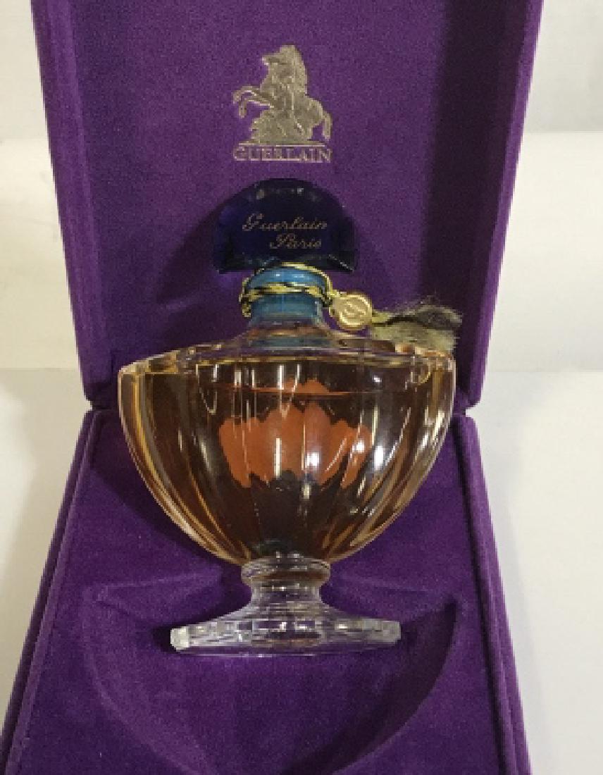 Vintage SHALIMAR by GUERLAIN - Sealed, In Box: Comes in the Vintage Purple Velour Presentation Box. Bottle measures 4 in. Possibly 1 FL. OZ, not marked. This Vintage Parfum has a deep amber glow. This Parfum was created in 1921 but The Parisian Gu