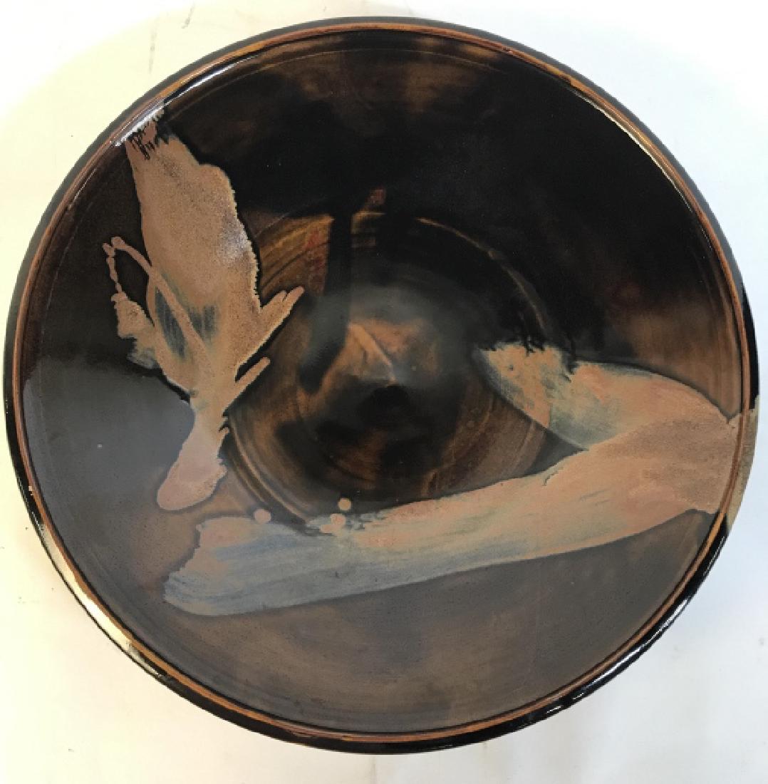 DIER Painted Decorative Ceramic Plate: Underside of piece is marked DIER. Piece has various shades of brown tones. Centerpiece plate, centerpiece bowl. Measures approx 16 inches wide, 3 inches tall. shelf piece, home accent tableware, tabl