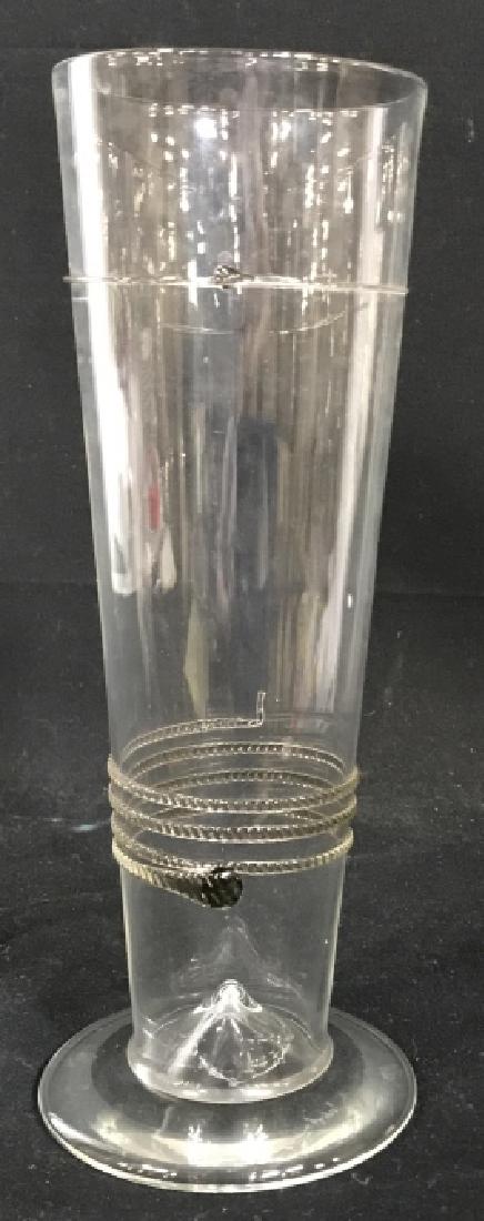 SIGNED JULISKA Hand Blown Art Glass Vase: Detailed with a roped snake like Figure. Approx 10.5 in. tall. Base 4 in. dia. Hand Blown in Czech Republic. JULISKA is a Hungarian name. The company was named after a friend of the owners who oozed i
