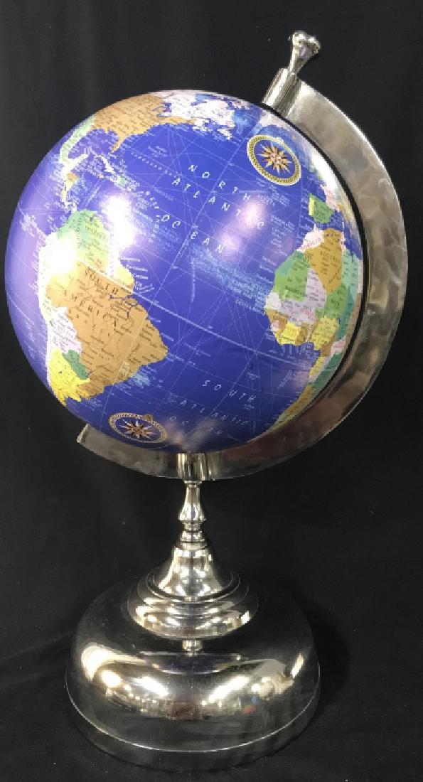 Tabletop Globe On Silver Toned Metal Stand: Tabletop Globe On Silver Toned Metal Stand, some surface mark to globe, measures approx 29 inches tall x 16 inches wide. Globe, World Map, Tabletop Decor. 2