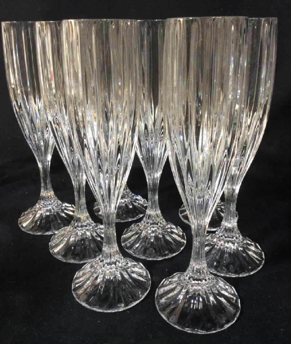 Set 32 Vintage Cut Crystal Beverage Glasses: Vertical Cut Crystal Pattern. 8 Champagne Flutes, 13 Wine Stem Glasses, 11 Larger Matching Water Stem Glasses, or use for Wine. Does not appear to have major condition issues like rim chips or cracks,