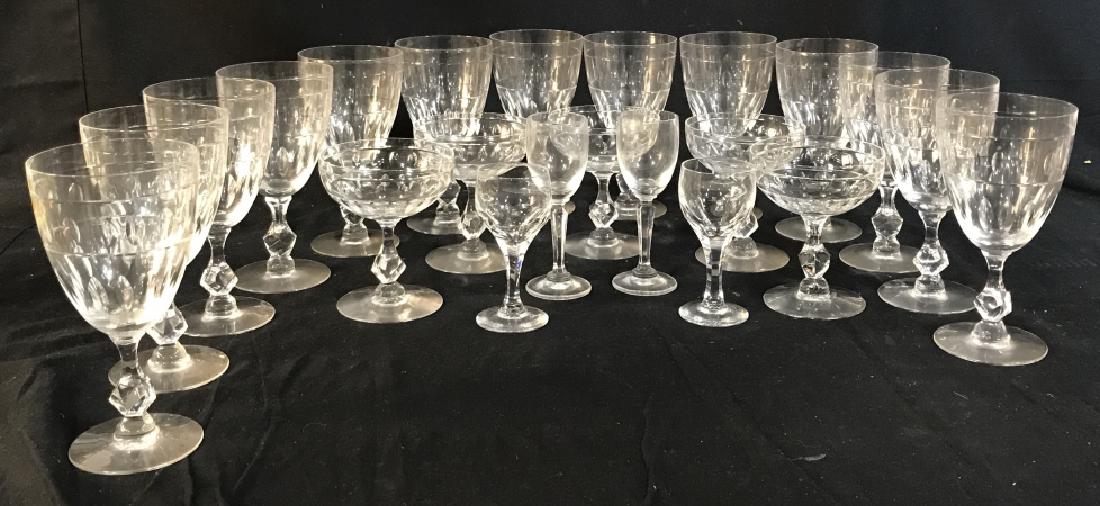 Set 22 Vintage Crystal Glassware: Possible Handmade. 2 sets of different cordial glasses. 4 1/4, & 5 1/8 in. tall respectively. Sm. Cordial has one sm chip at base. 5 Margarita/Sparking Wine Glasses. 4.5 in. tall, 3 3/4 in. diameter.
