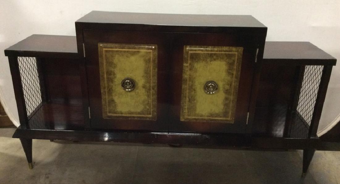 Vintage Lacquered Console table,: Television stand / console table, hall table, is dark brown toned. Contains 2 Cabinet doors with 1 self inside. Cabinet doors have gold toned circular shaped handles and green toned possibly leather f