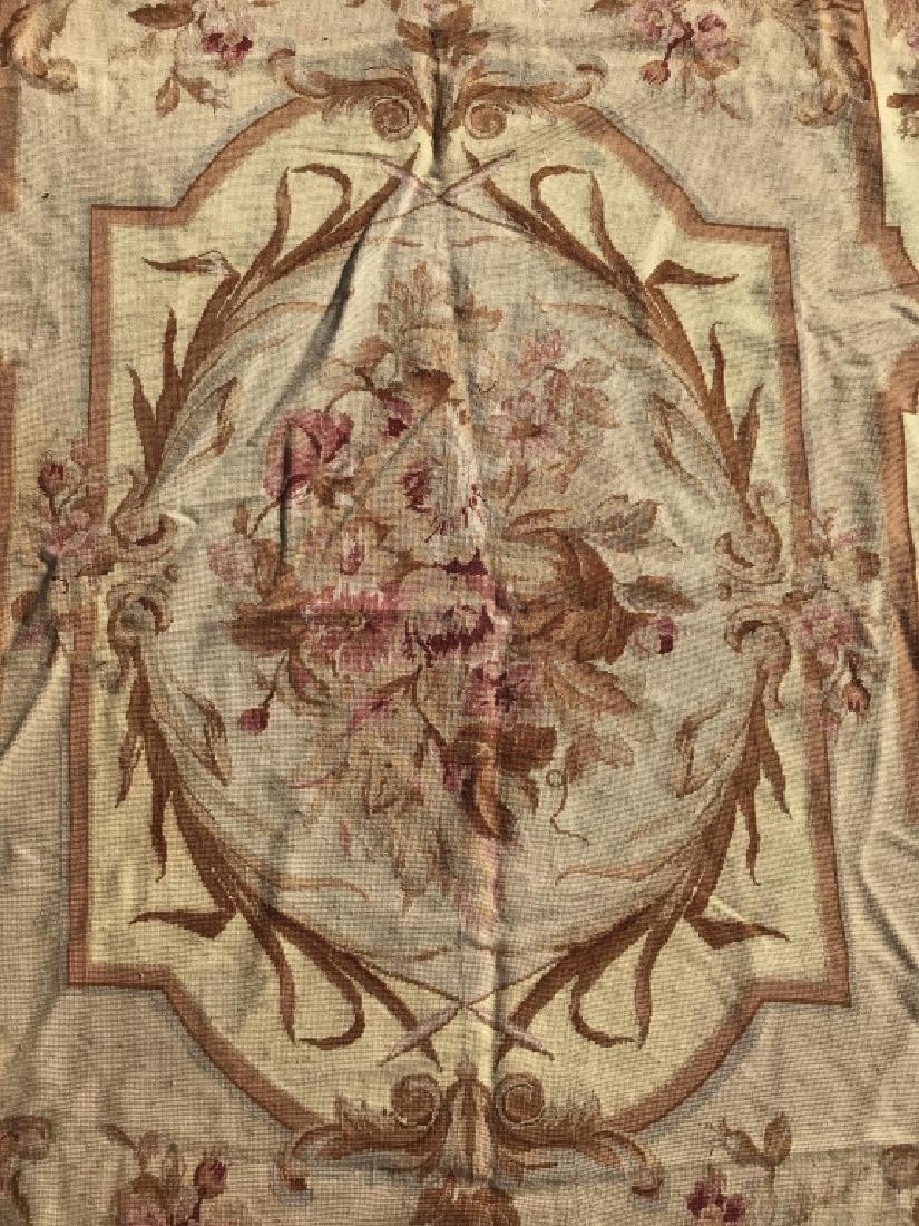 Handmade Floral Detailed Needlepoint Rug: Rug is handmade & Needlepoint. Contains multi toned floral & leaf detail with tones of olive beige pink & cream Rug appears to Possibly be Aubusson. Contains some surface wear. Measures approx 105 inc