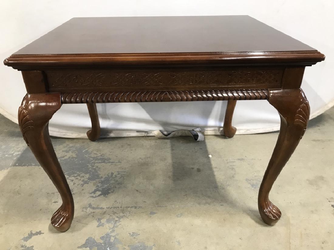 Carved Wooden Cabriole Leg Side Table: Side table has carved wooden detail. Contains cabriole legs. Piece is brown toned. Measures approx 28 inches long 22 inches tall and deep. home accent, home furnishings, side table end table 6