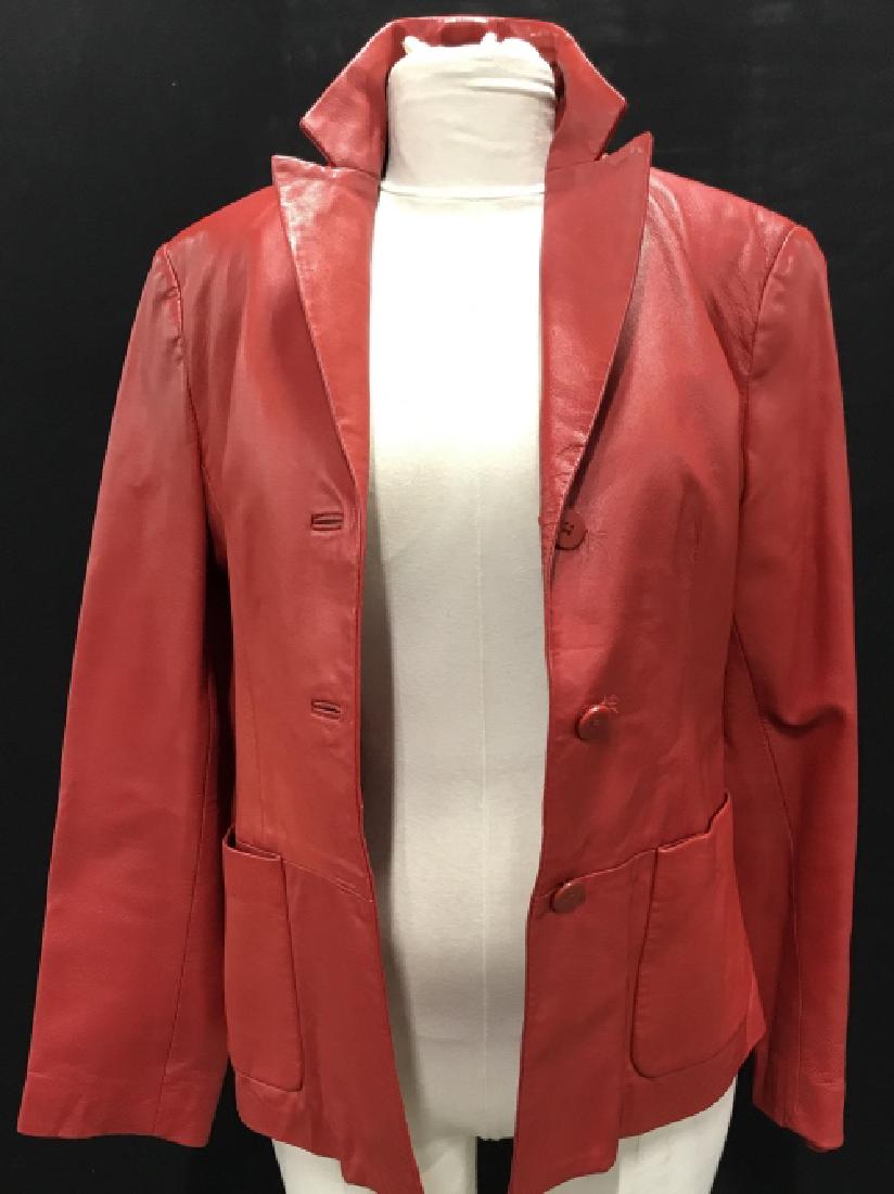Vintage DKNY Red Leather Jacket: Leather is very clean. No marks. Inside Lining is Acetate. Two Outside Pockets. Buttons need re- sewing neatly, but are original. Size 8 Approx 23 in. long from shoulder. Designer Casual Leather Jacke