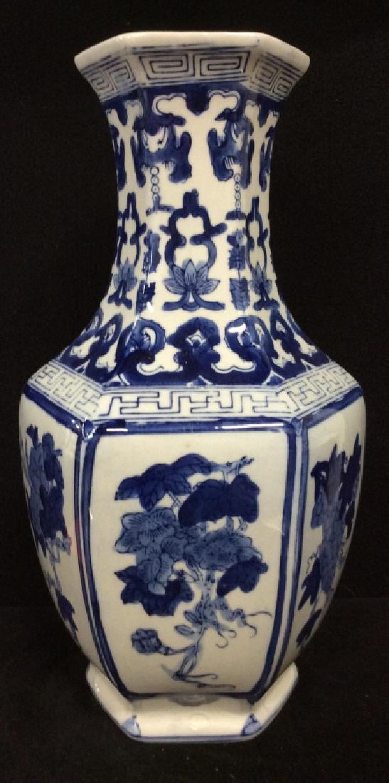 Large Asian Porcelain vase: grey/white toned glaze finish with blue toned flower design. Some minor surface wear and imperfections. Measures approx 14 in by 8 in, asian arts and crafts, decorative arts and accessories, vase vess