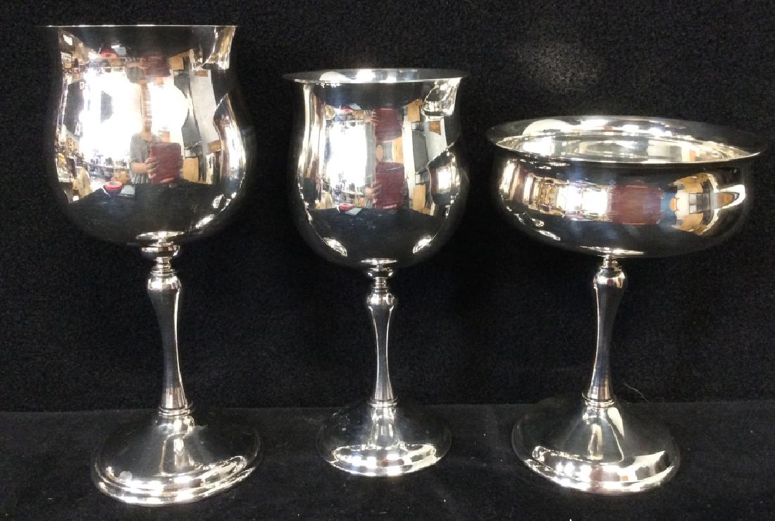 Set 36 KIRK Silver Plate Stemware, Spain: 3 different sizes Set includes 12 champagne coupes, 12 red wine goblets, and 12 white wine goblets. Marked on underside as Kirk silver plate, Spain. Some discoloration and scratches from use. Tallest 