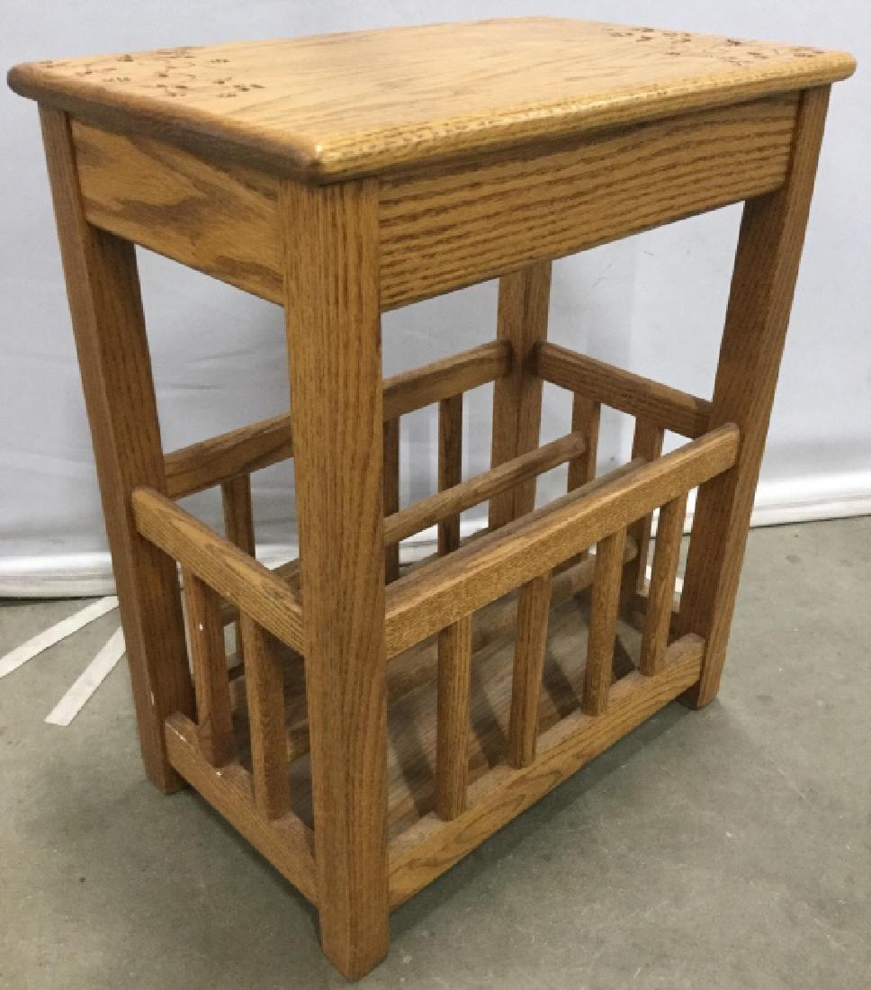 Vintage Wooden Side Table W Magazine Holder: Table has carved wooden floral vine and leaf detail. Lower half of piece has 3 space Magazine Holder. Piece measures approx 20 inches long 24 inches tall, 12.5 inches deep. end table, side table, home
