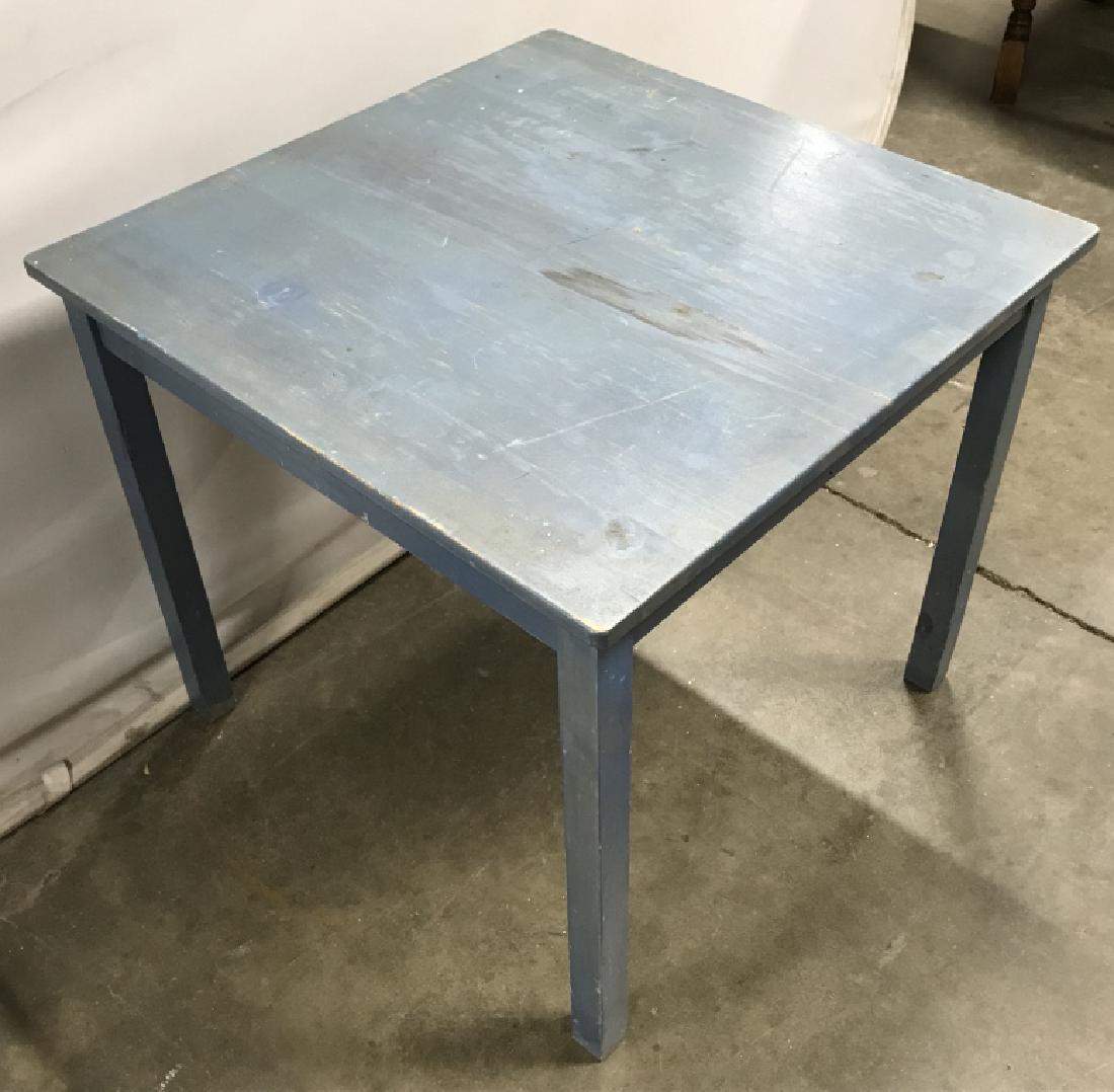 Painted Blue Wood Side Table: Measures approx 21 inches in height by 23.5 inches squared in length and width. Some surface wear of painted surface, might need another coat of paint. Side table, end table, nightstand, petite painte