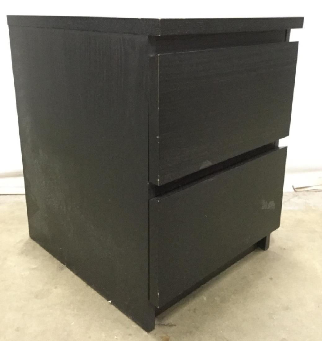 Black Toned Wooden 2 Drawer File Cabinet: Cabinet contains 2 drawers. Piece is black toned and wooden. Piece measures approx 22 inches tall 19 inches deep 16 inches wide. Cabinet, side table, office furnishings, use as side / end lamp table 6