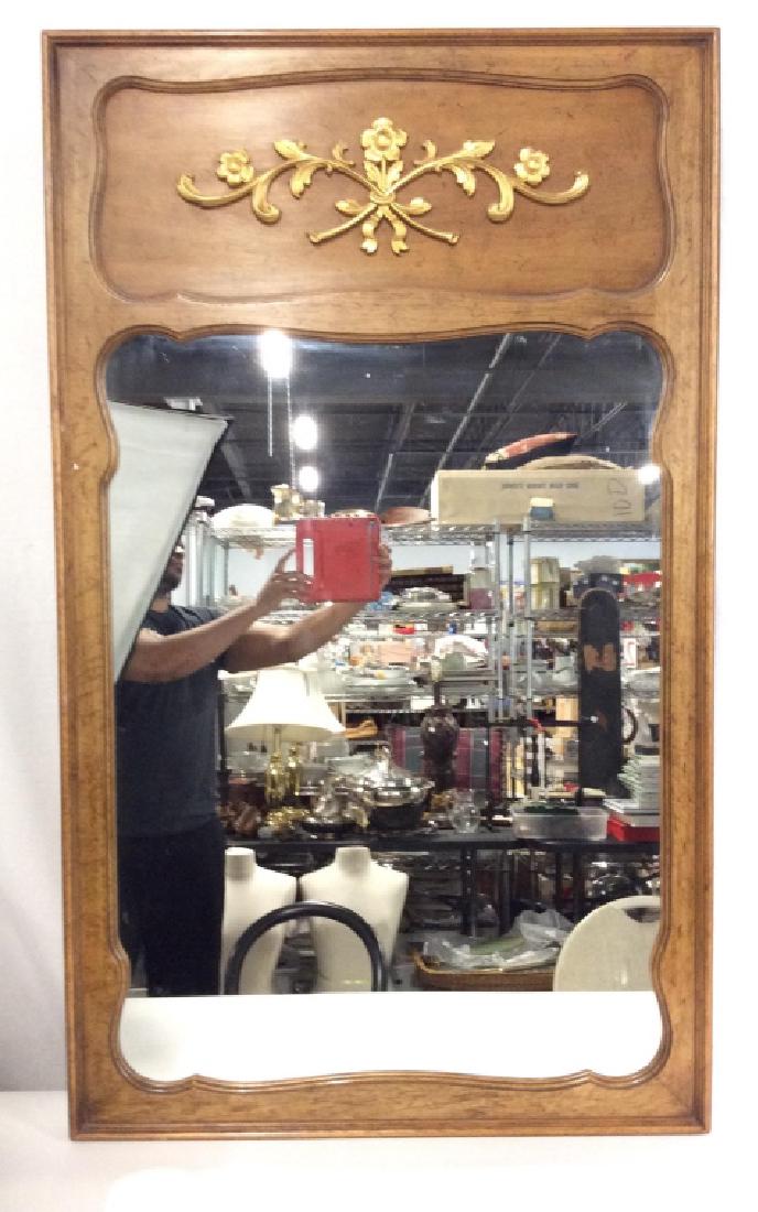 Carved Wood Frame Wall Mirror: Mirror has carved wooden frame. Frame has a light brown beige tone with gold toned carved ornate floral detail. Piece measures approx 32 inches wide, 54 inches tall. Wall mirror, hall mirror home acce