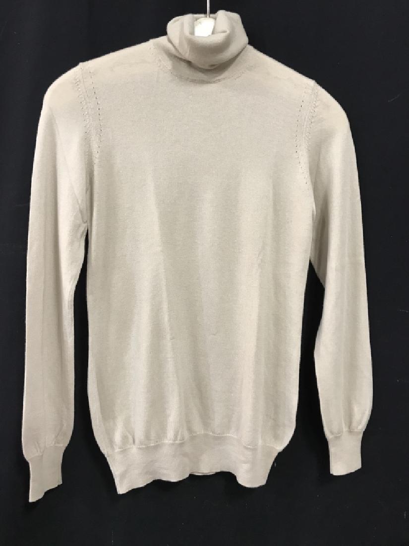 LORO PIANA Luxury Designer Cashmere Sweater: Turtleneck sweater. Label reads for LORO PIANA, Made In Italy, Size 40, 100% Cashmere. Sweater is oatmeal beige in tone. Good condition, except for two minor pulls in fabric. LORO PIANA Designer sweat