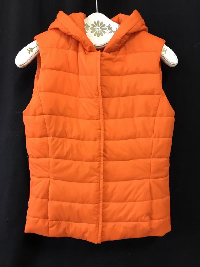 COLOMBO Designer Vibrant Quilted Outerwear Vest: Vest with hood. Label reads for COLOMBO, Size 46. Quilted vest is vibrant orange in tone. Good condition. Designer luxury garment, fashion accessory, cold-weather clothing, designer fashion, wearable.