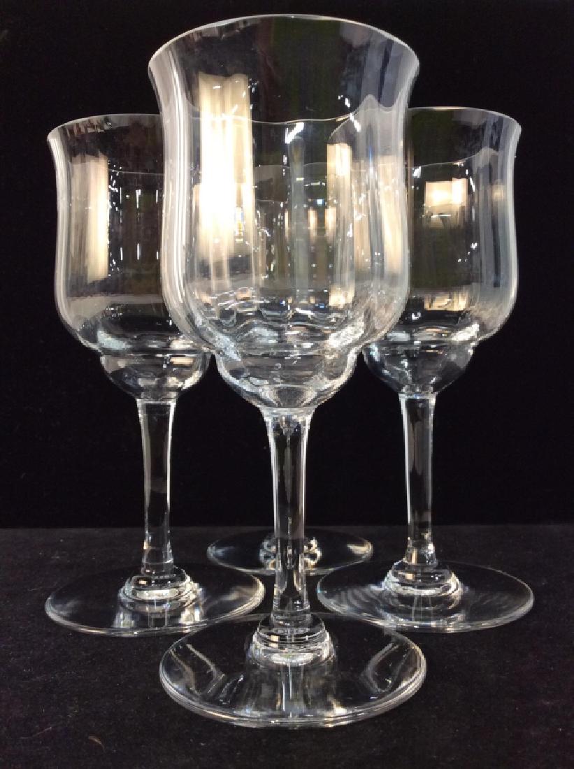 Set 4 BACCARAT Cut Crystal Stemware: Underside is marked BACCARAT. Lot includes 4 Cut Crystal wine glasses. Each measures approx 6 inches tall 2.75 inches wide. Wine glasses, Crystal Stemware, Baccarat Wine Glasses. 6