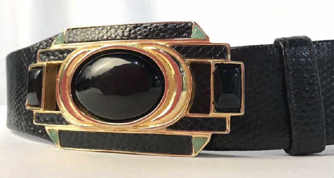 Judith Leiber Black Lizard Belt W Stone Buckle: Judith LEIBER Luxury Designer fashion black lizard skin belt. Geometric Belt buckle closure has black stone style details set in gold tone hardware frame. Marked for Judith LEIBER. Double hook eye clo