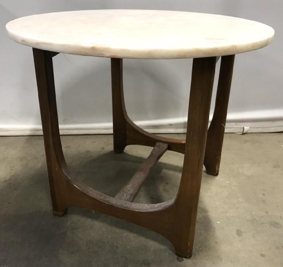 Scandinavian MCM Marble Top Over Wood Side Table: Scandinavian mid-Century modern marble top table with wood base. Measures approx 21 inches in height by 25 inches in diameter. Some surface wear of wood base, including scuffs and blemish, might need 