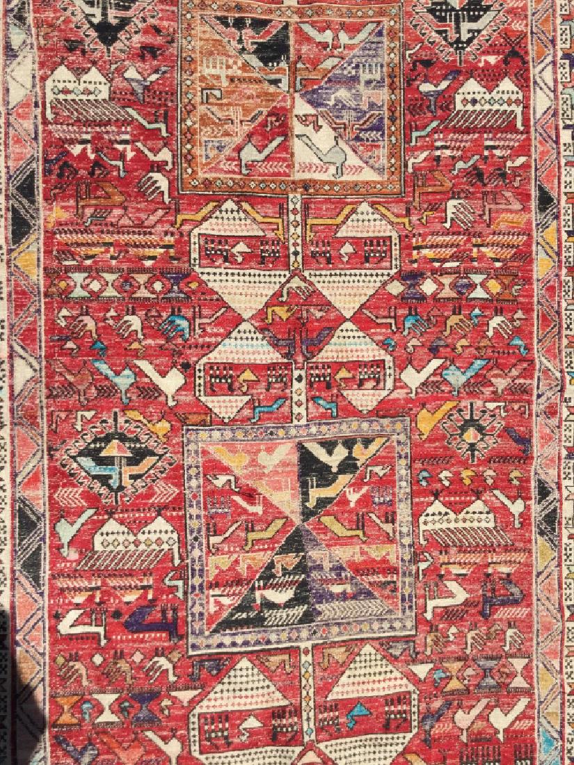 Handmade Geometrically Detailed Wool Rug: Piece contains tones, of red, orange, teal, cream, and black. Contains fringes. Measures approx 74 inches long 44 inches wide. Rug, carpet, home accent, home accessory and decor. 6
