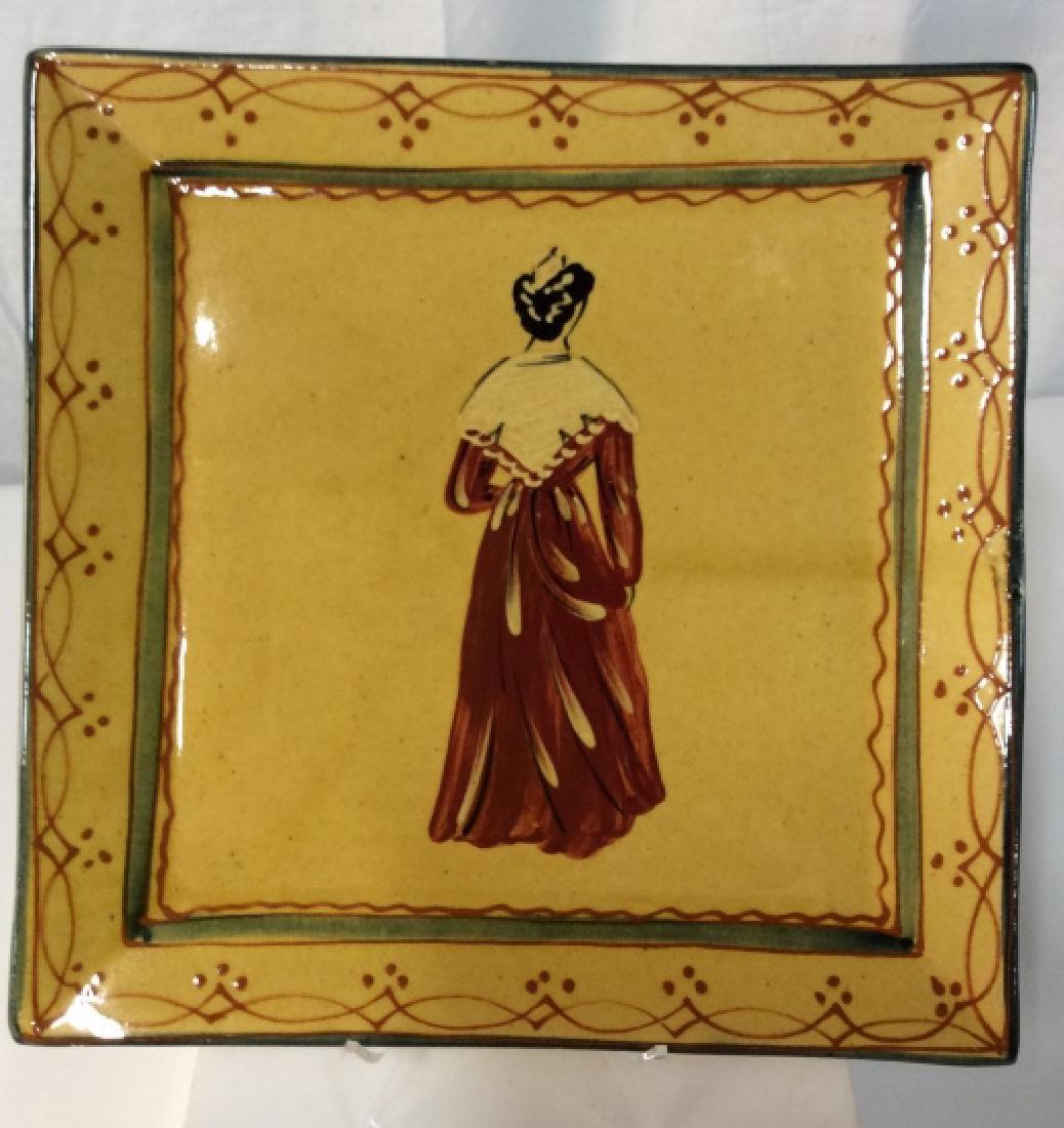French Province Hand Crafted Pottery Plate: Provincial colors of yellow and rust red and green. Woman figure facing away. Marked on underside. 11 in. Sq. One slight scuff on rim. Vintage French Pottery, French Kitchen Decor, Country Kitchen Ser