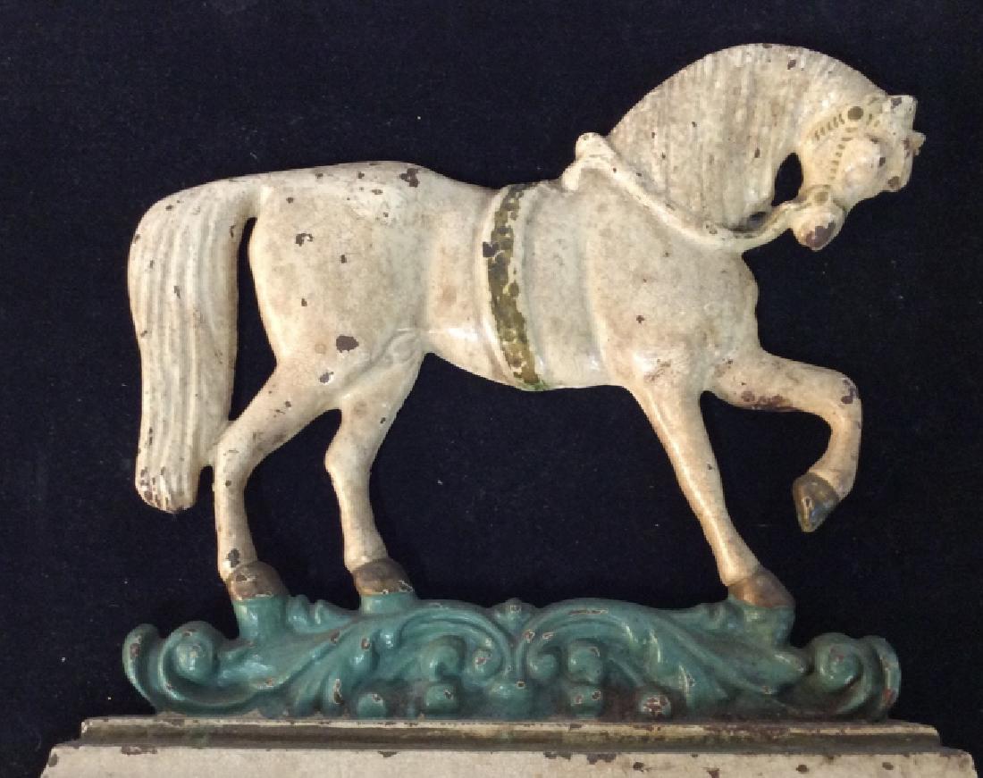1930s Cast Iron Prancing Horse Doorstop: Early 20th c., circa 1930s. Painted Iron Horse Doorstop On Platform, approx 11 x 12 1/4 in. Some paint crackle and paint flaking from age and use. Mild rust. Vintage Iron Doorstop, Equestrian Decor, C