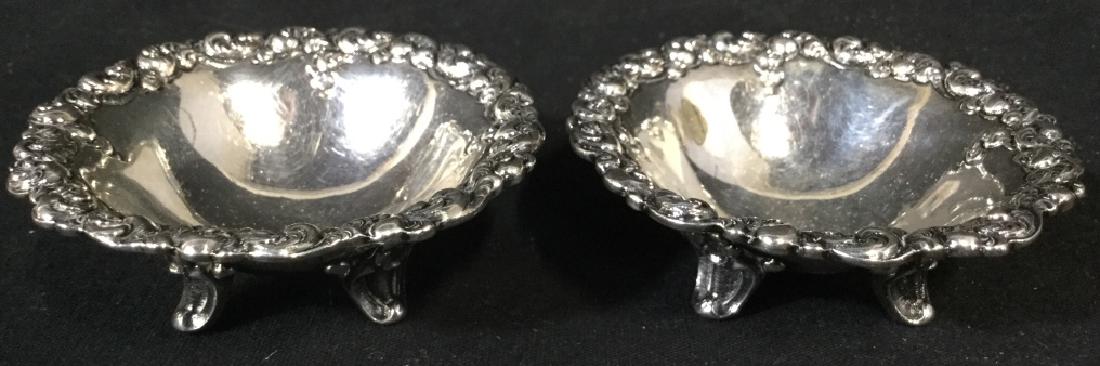 Pair Footed Sterling Silver Trinket Dishes: Each piece is marked STERLING on underside. Pieces are footed. Each measures approx 3 inches wide, 1 inches tall. Trinket dishes, tableware dip dishes, finger bowls, condiment dishes 6.