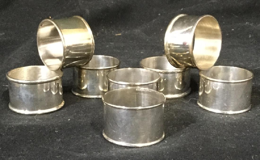 Lot 8 Sterling Silver Napkin Rings: Lot includes 8 napkin rings. Each are marked 925. EACH measures approx 1.5 inches diameter. Napkin rings, tableware, place setting accessory 6