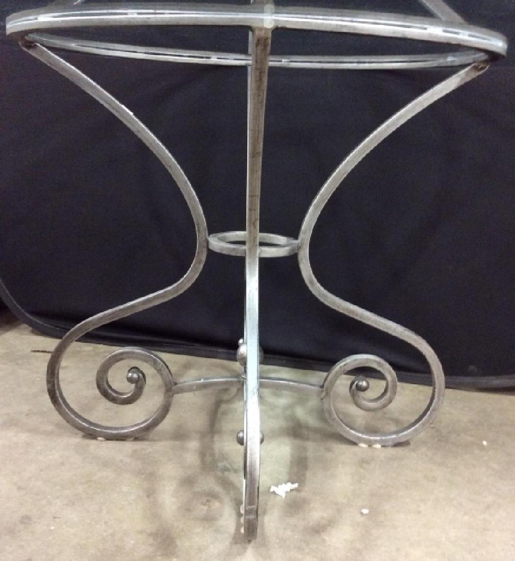 Round Glass Top Table: Table base is silver toned & Metal. Piece has thick round glass top. Measures approx 48 inches diameter, 29 inches tall. Glass top table, kitchen table, brakfast table, home accent, home furnishings 6