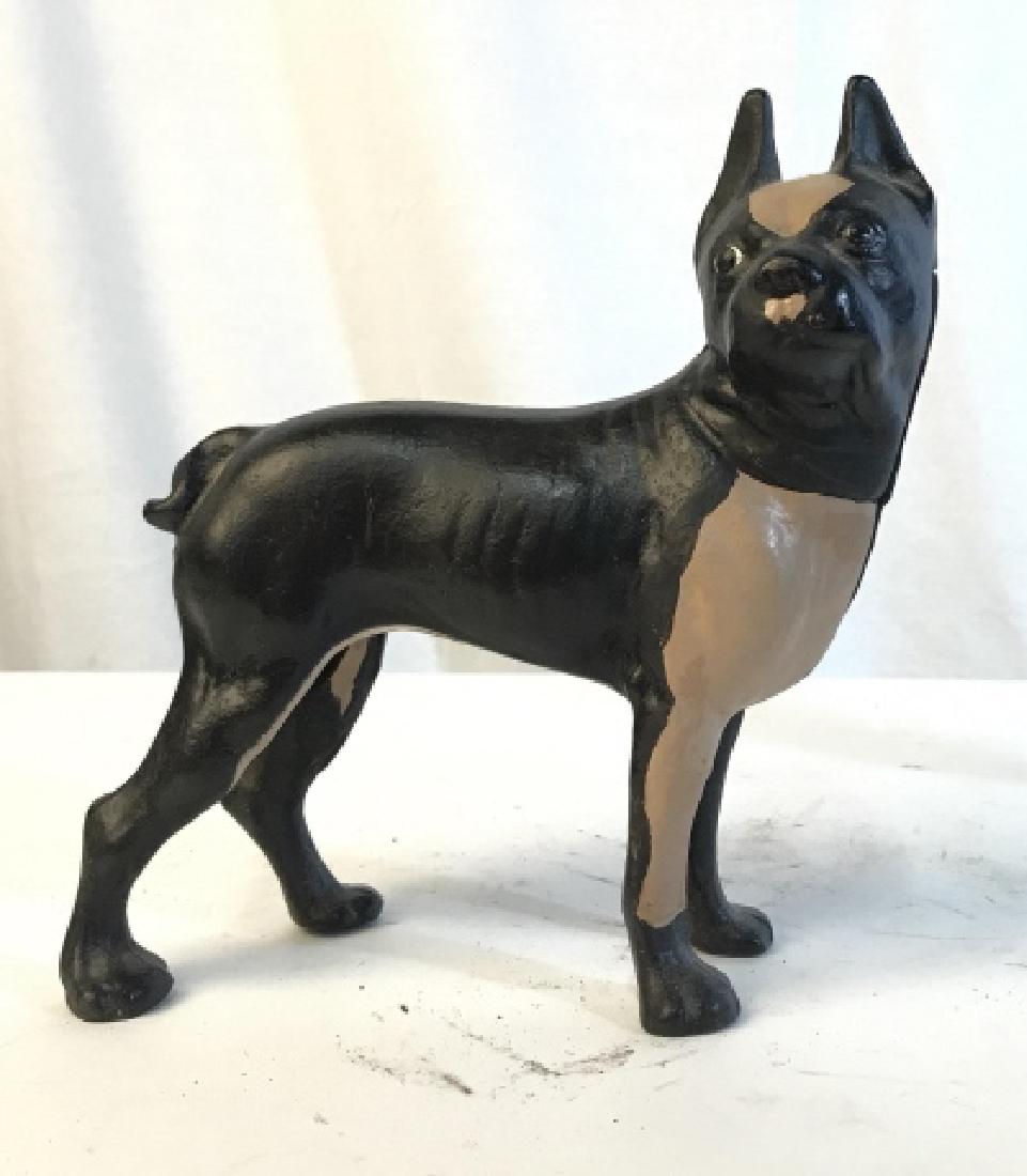 Cast Iron Boston Terrier Door Stop: The door stops here with this Cast Iron Boston Terrier doorstop. This piece may be alternatively used as a book end. Measures approx at 8.5 in tall and 8.0 in wide. Home accessory, home decor, home ac