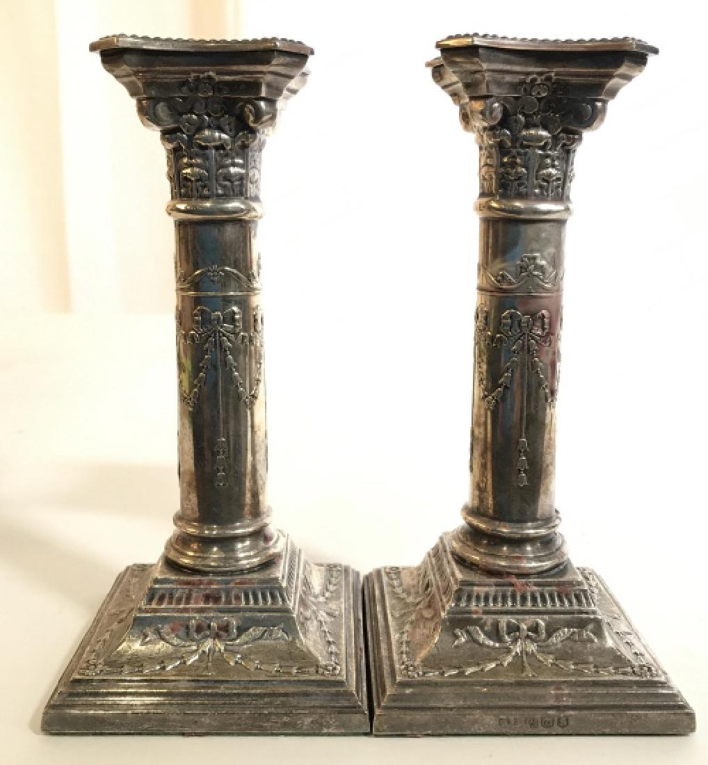 Pr English Silver Pl Candlesticks: Pair of richly detailed silver plate Candlesticks, columnar style, swags and florals each Measures ht app 7.5 inches, base app 3.5 inches square each with 5 trademarks, tableware, tabletop accessory, 