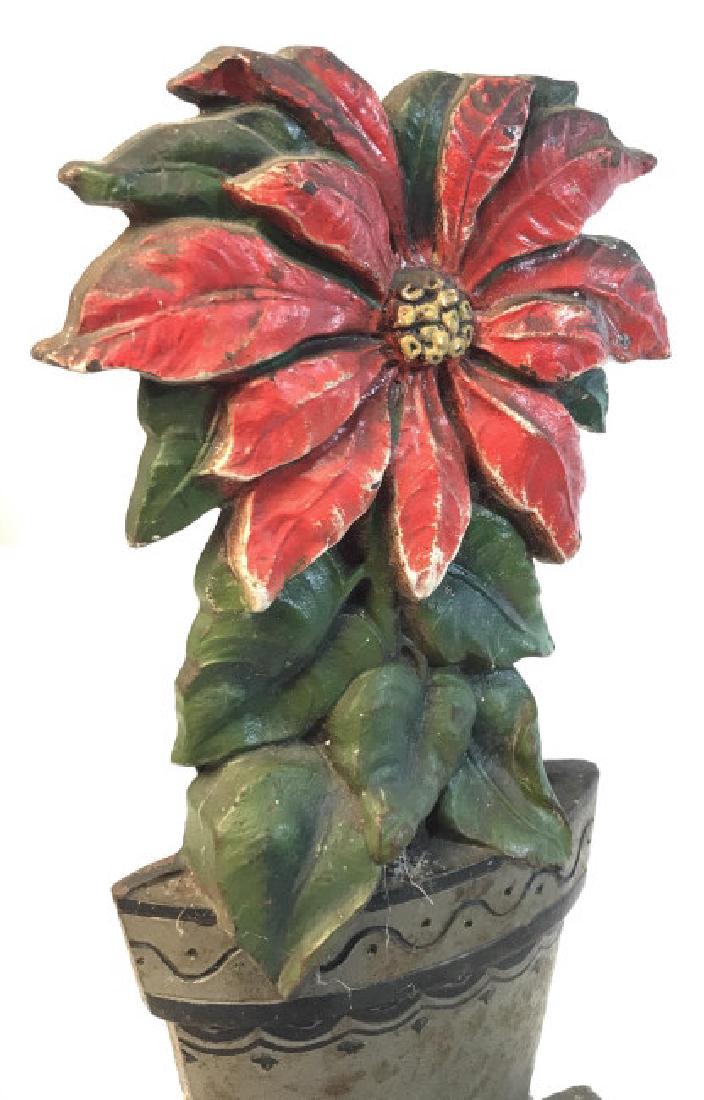 Cast Iron Red Flower Doorstop: Vintage inspired cast iron red flower doorstop. Hand painted piece. Measures at approx 10.3 in tall, and 4.8 in wide. Cast iron, vintage inspired, doors, doorstop, flower decor, outdoor furniture, hom