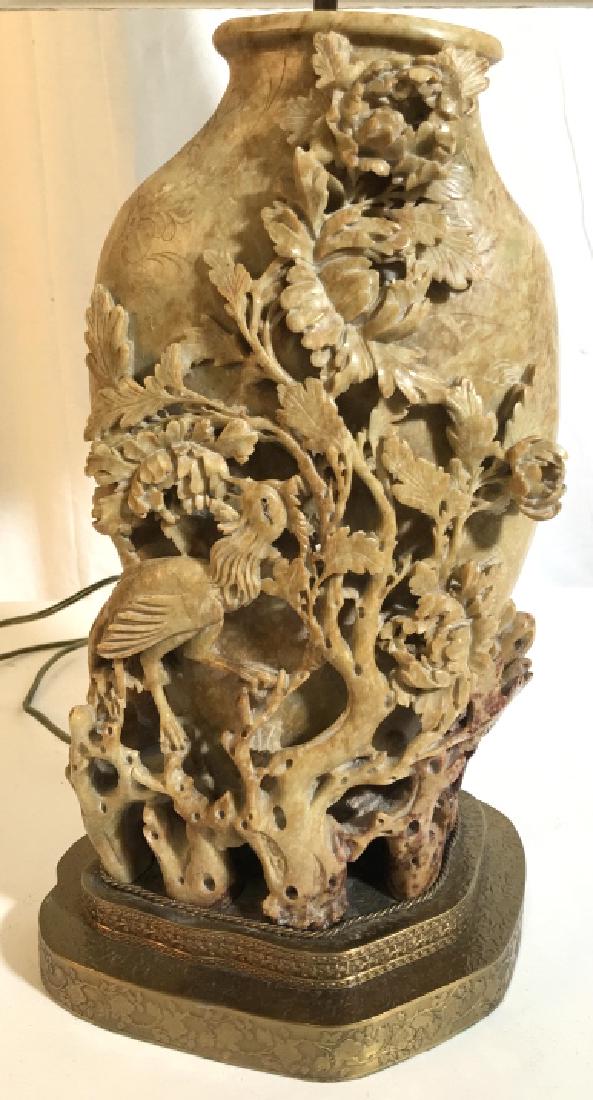 Chinese Carved Soapstone Vase into Lamp: Vintage hand carved soapstone vase, with cranes, trees, flowers and garden setting, additional etched detailing, Chinese vase into lamp mounted on brass Repousse base, and brass stand to lamp with sha