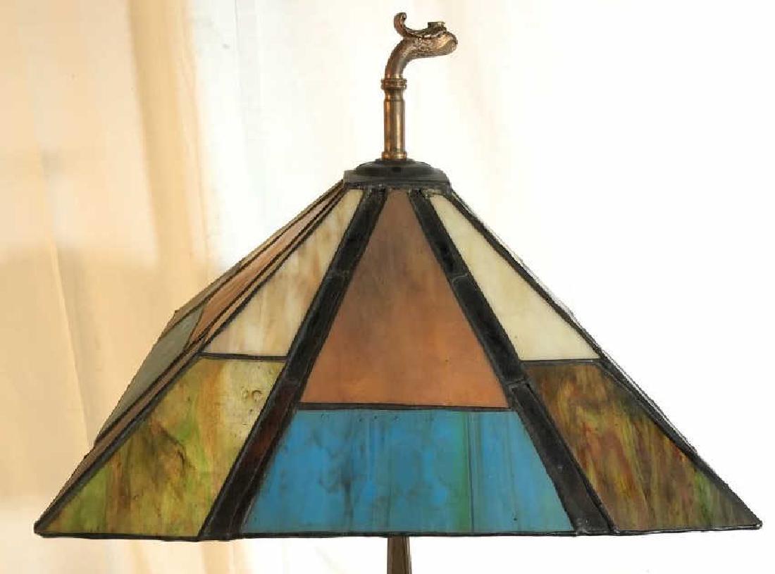 Panel Glass Shade Bronze Base Lamp: Tiffany style arts and Crafts shade, slag glass panels on gold tinged bronze base with square alabaster center, ensures app 29 inches ht to serpent head finial, base measures app 5.5 inches square, ho