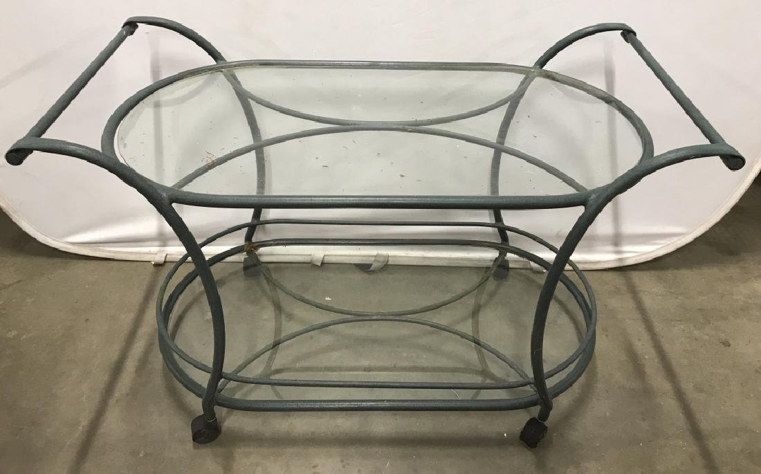 BROWN JORDAN Outdoor Serving Cart W Glass Shelves: Marked for BROWN JORDAN. Outdoor garden patio two-tier serving cart with glass shelves in metal frame. Dark green blue in tone. Measures approx 30.5 inches in height by 46 inches in width by 22.5 inch