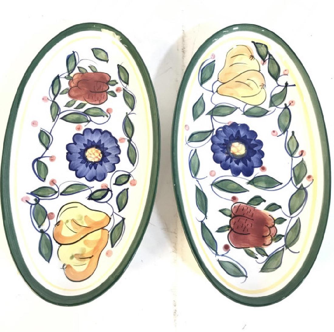 Lot 2 Floral, Fruit, & Leaf Detailed Oval Plates: Lot includes 2 Floral, Fruit, & Leaf Detailed Oval Plates. Possibly hand painted. Each measures approx 12 inches long 6 inches wide. Tableware, tabletop accesosry, trinket dishes, candy dishes 6