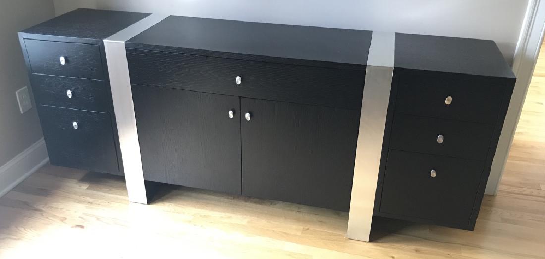 Custom Contemporary Black And Silver Credenza: Custom Contemporary Black Ebony Toned And Silver Toned Credenza with silver toned metal drawer pulls, black toned portion of the desk has wood grain finish, three drawers on each side flank center dra