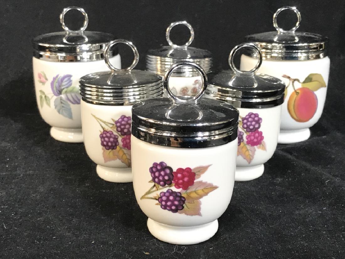Lot 6 Vintage Royal WORCESTER Egg Coddlers: Underside of each reads ROYAL WORCESTER MADE IN ENGLAND. Each have depiction of fruit or flowers. Includes 2 large coddlers & 4 small. Large coddlers Measure approx 4 inches tall 2.5 inches wide. tabl