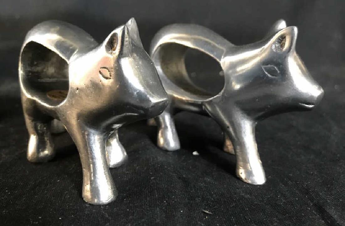 Silver Toned Metal Animal Napkin Rings: Lot includes 4 napkin rings. 2 pig shaped & 2 chicken shaped. Pig napkin rings measure approx 3.5 inches long, 2 inches tall. Animal figurals, farm house accessory, napkin rings, napkin holders 6.