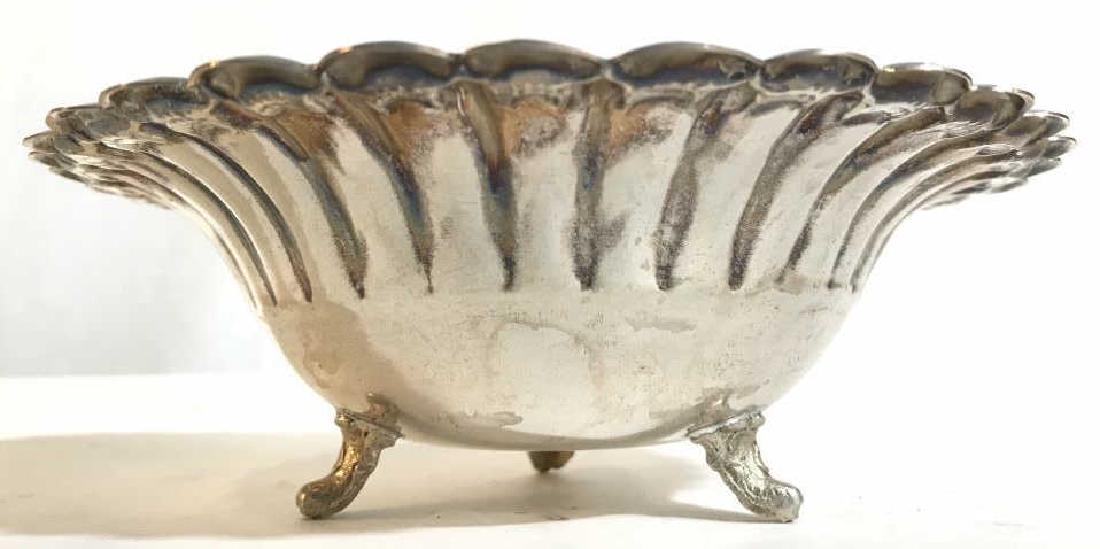 Sterling Silver Footed Bowl: Bowl contains 3 feet. Center of piece is marked 925. Measures approx 6 inches wide 2 inches tall. Trinket dish, candy dish, tabletop accessory, tableware 6.