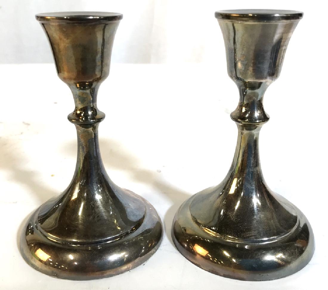 Pair Sterling Silver Candlesticks: Lot includes 2 Sterling Silver Candlesticks. Each are marked 925 on base. Each measures approx 5 inches tall 3 inches wide. Sterling Silver, Sterling Candlesticks, Sterling Tableware, Sterling Tableto