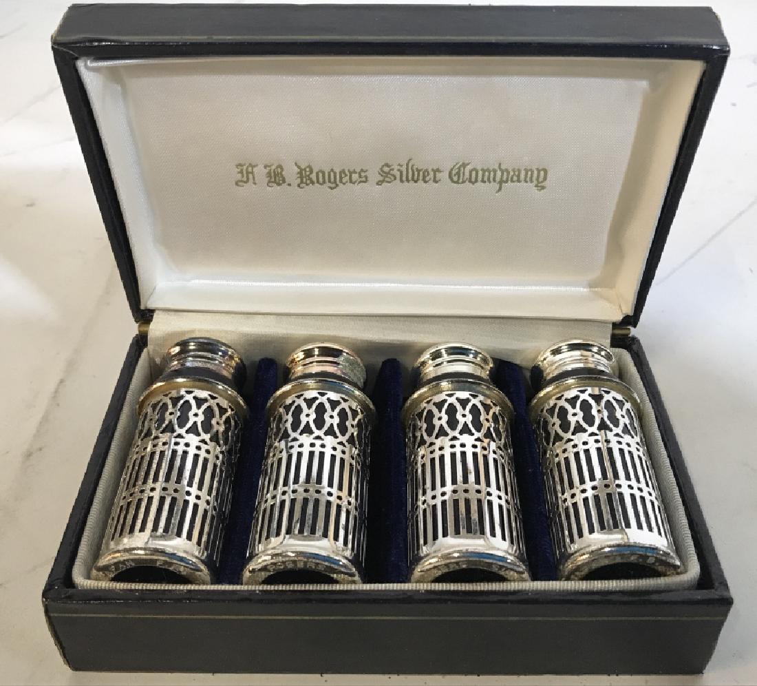 4 FB RODGERS SILVER COMPANY Salt & Pepper Shakers: Lot includes 2 Salt & 2 Pepper Shakers. Includes original box. Box Measures approx 5 inches long 3.5 inches deep 1.75 inches tall. Salt and pepper shaers, tableware, tabletop accessories 6
