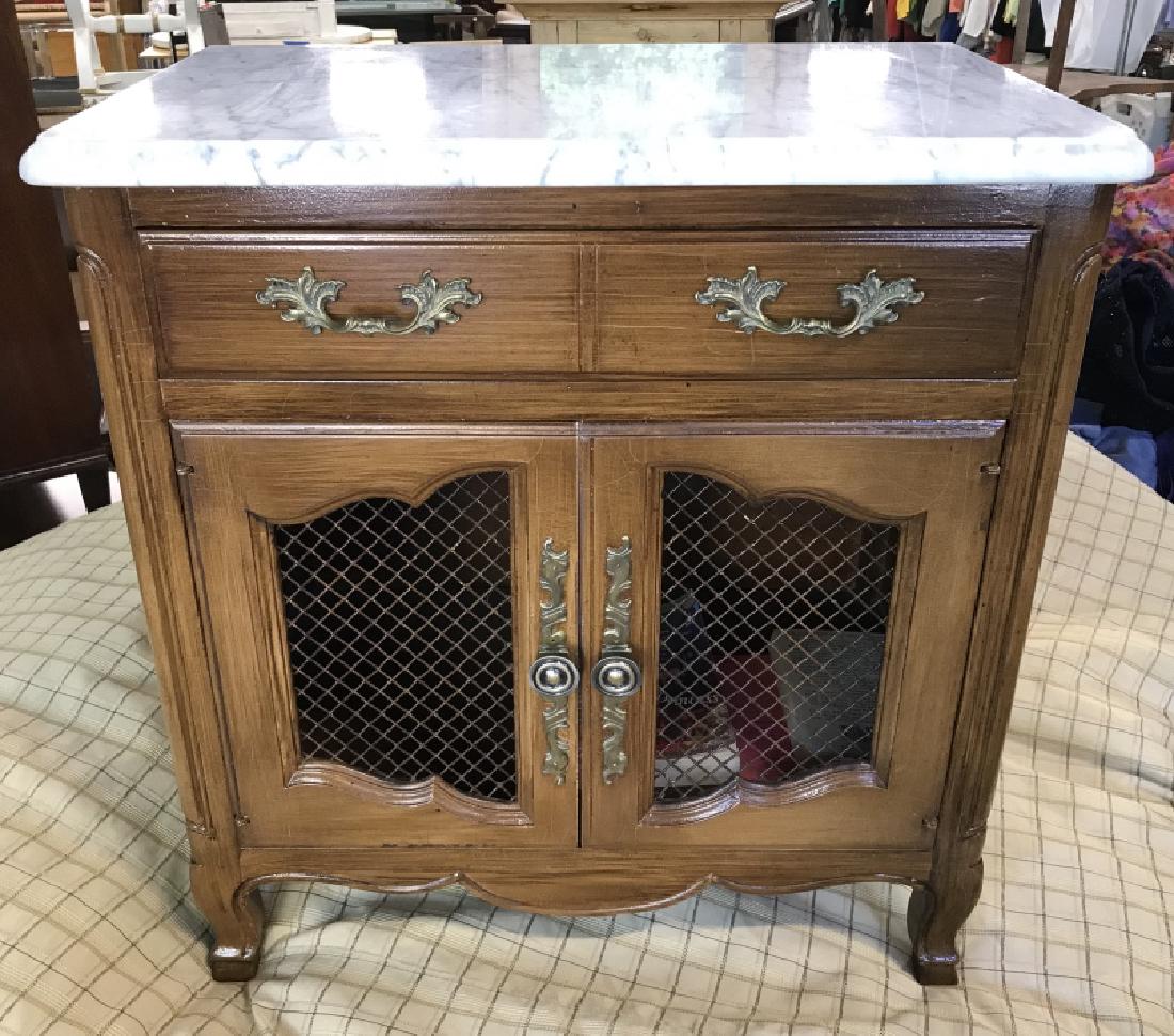 Vintage JOHN WIDDICOMB Marble Top Nightstand: Wood Nightstand has top drawer and bottom two door cabinet. Doors have metal lattice design. White and grey tone marble top. Measures approx 25.25 inches in height by 24 inches in width by 15 inches i