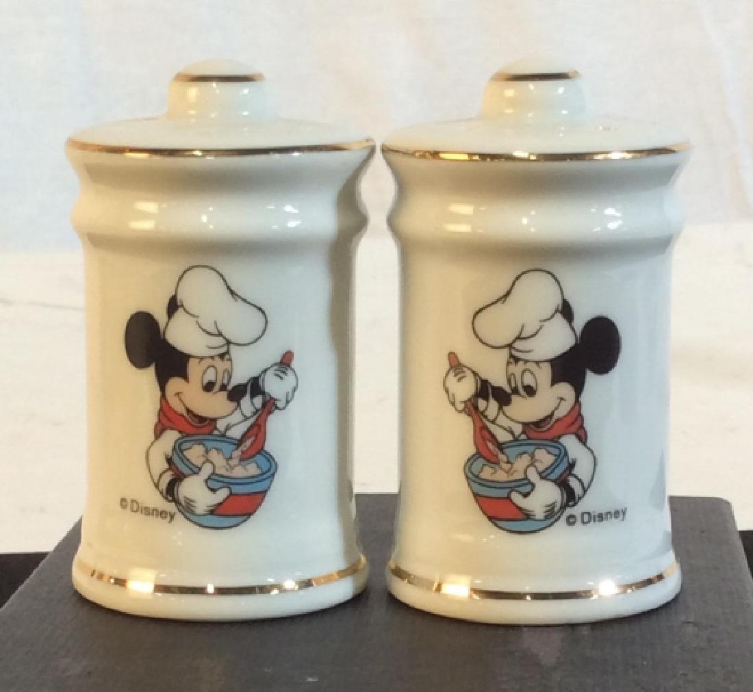 Set Vintage Disney Mickey Salt & Pepper Shakers: Porcelain with Gold toned Trim. No Marks and No Paint Fade. A Collectors Item if You Love Mickey Mouse. Salt Shaker has 6 holes, Pepper Shaker has 4, but they are larger in size. approx 2.5 in. tall,